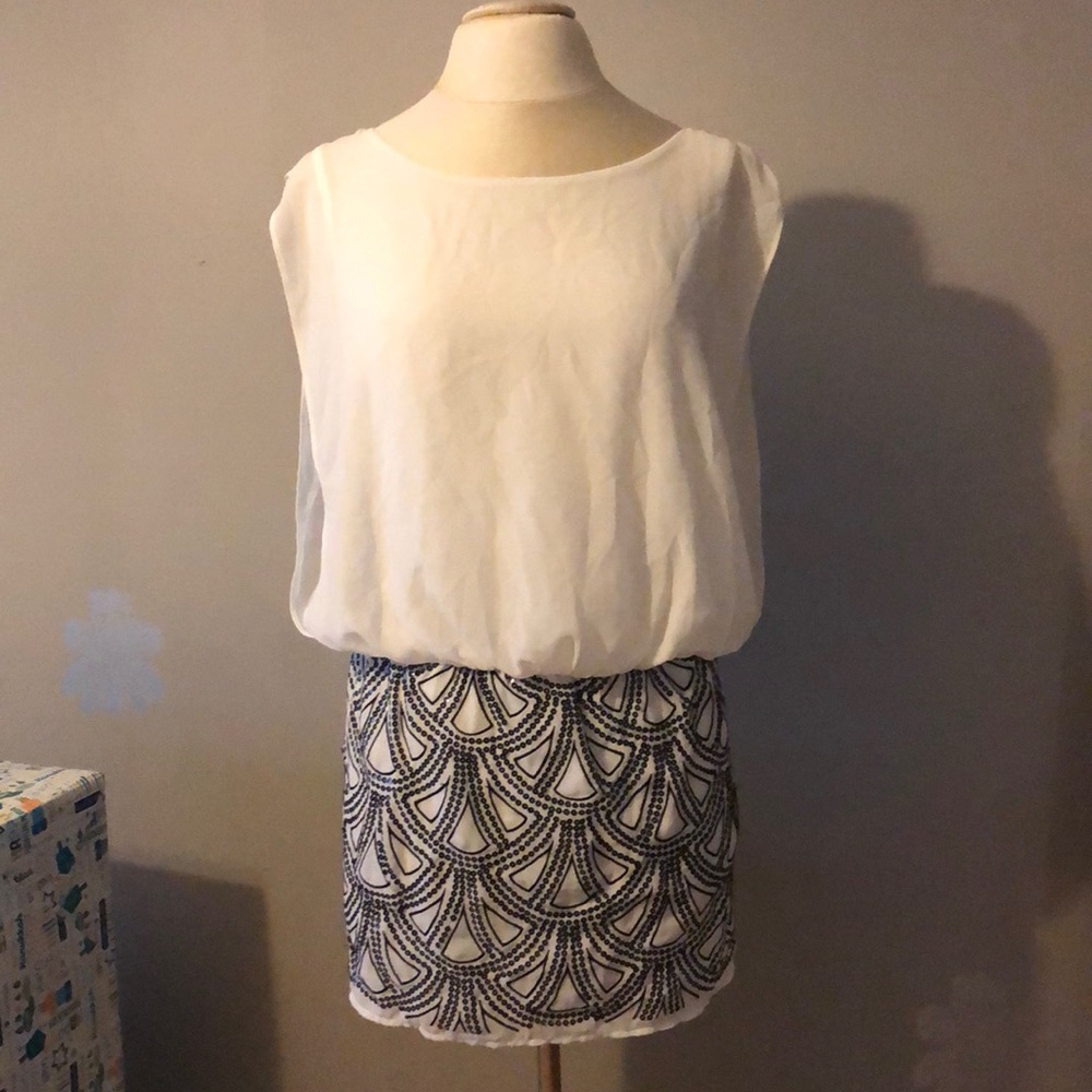 Sexy white cocktail dress with sequins